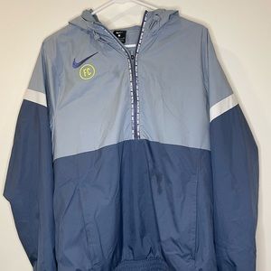 Light blue Nike FC windbreaker w/ hood